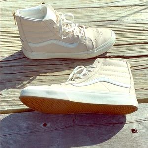 Pink leather Vans high tops